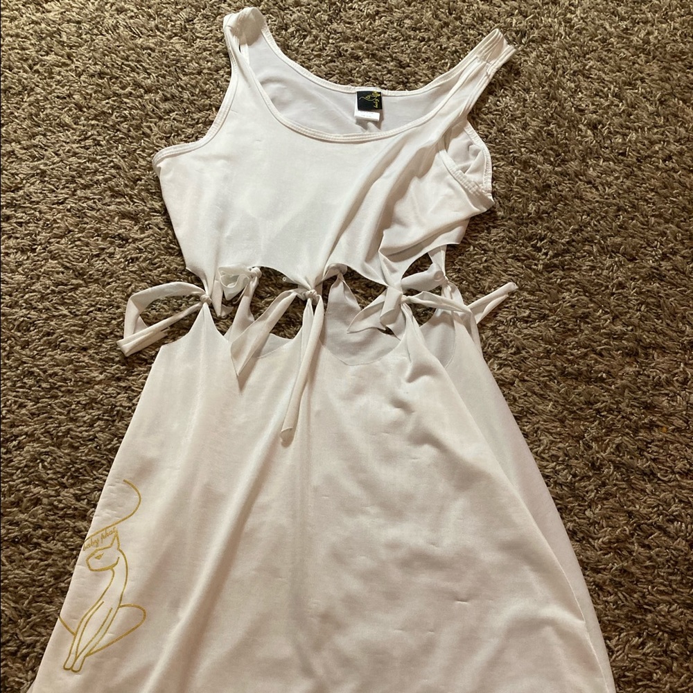 Baby phat dress. Never worn . White and gold. Size M